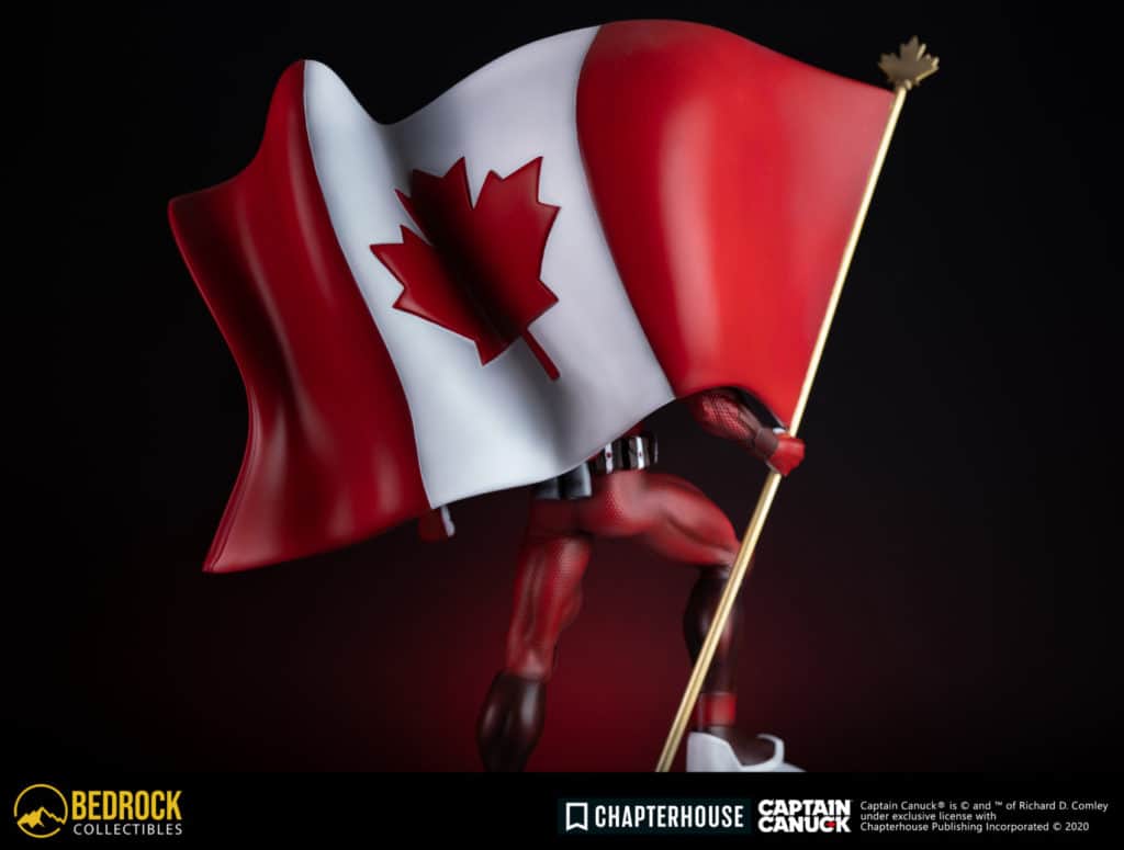 captain canuck prootype statue behind flag view