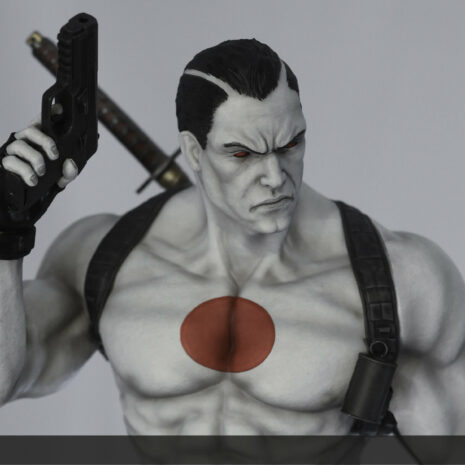 Bloodshot 3qt top left pistol and nanite chest closeup Bloodshot statue pose holding right hand pistol in air in a closeup overhead shot