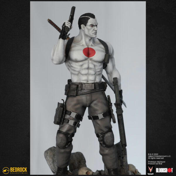 Bloodshot collectible statue 3qt left holding pistol and assault rifle with nanite chest visible
