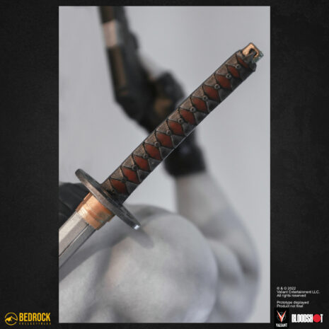 Bloodshot valiant statue back katana hilt closeup bloodshot valiant statue back katana hilt closeup