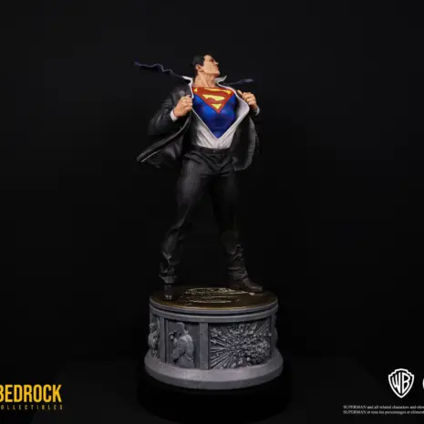 Superman-Statue-3qt-left Superman DC Secret Origins 1/4 scale statue by Bedrock Collectibles. 3 quarter left angle shot of Superman with narrative base