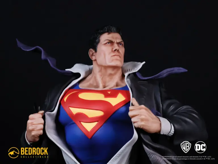 Superman Clark Kent 1/4 Scale statue close up with large S symbol and dress shirt and tie blowing in wind. Secret Origins 1/4 scale statue by Bedrock Collectibles