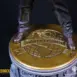 Superman standing on Daily Planet medallion floorplate. Superman's trousers and dress shoes detailed in the shot. As part Secret Origins narrative base by Bedrock Collectibles