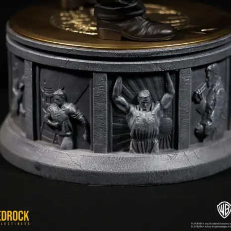 superman-origin-narrative-statue-base-bedrock-1 Superman Secret Origin narrative base by Bedrock Collectibles showing Superman faster than a speeding bullet. Superman's origin story carved as relief panels