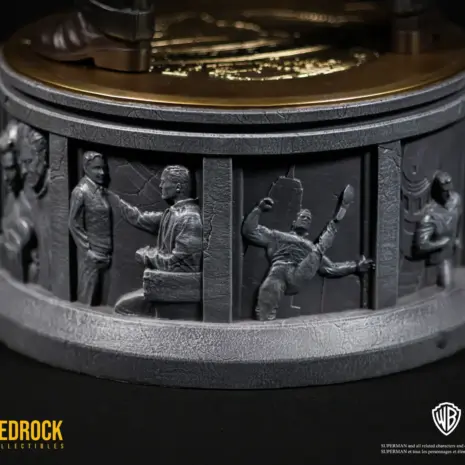 superman-origin-narrative-statue-base-bedrock-2 Superman Secret Origin narrative base by Bedrock Collectibles showing Superman leaping building and with his father in Kansas. Superman's origin story carved as relief panels