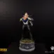 Superman DC Secret Origins Quarter Scale Statue by Bedrock Collectibles. Zoomed out show with lighting of Superman transforming from his work attire at the Daily Planet into his iconic Blue Superman suit with the iconic "S" symbol
