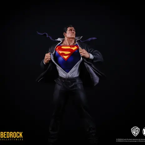 superman-secret-origins-statue-near-full-pose superman dc secret origins 1/4 scale statue zoomed in with S symbol prominently shown as part of Clark Kent's tranformation